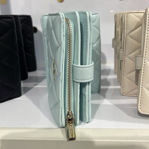 Kate Spade Carey Medium Compartment Bifold Wallet
COLOR: Turquoise - Picture 14 of 16